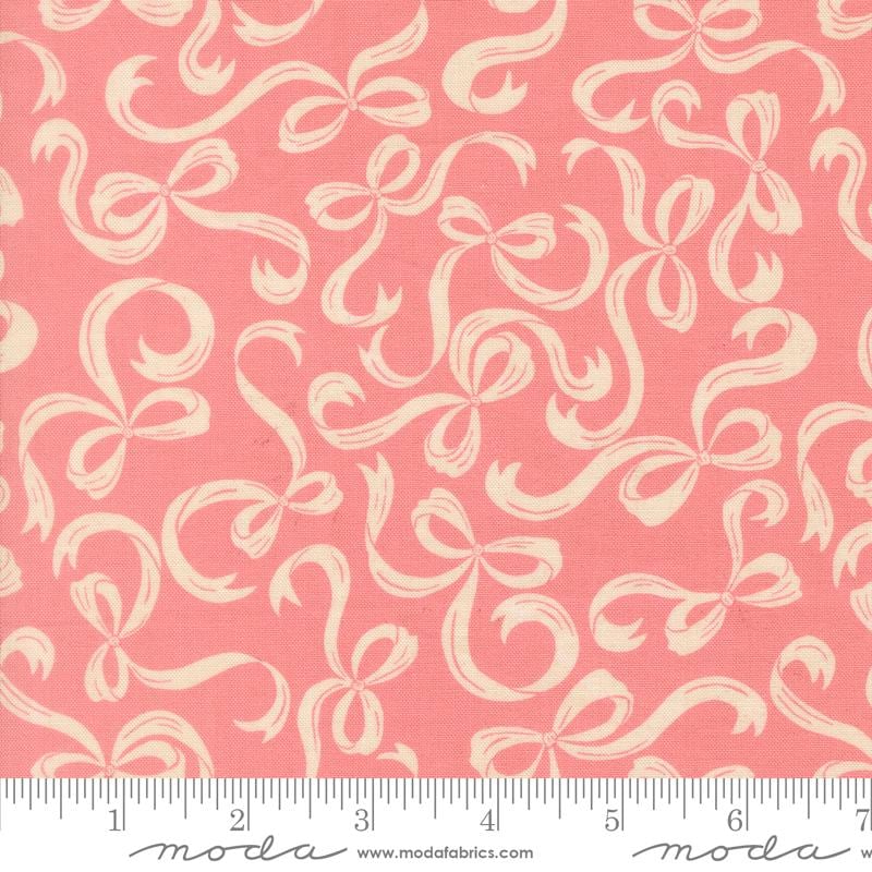 a repeating pattern of white bows on a pink background.
