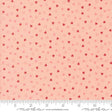 a fabric with a repeating pattern of small hearts in shades of pink and red. The pattern is spread across the fabric, creating a visually appealing and vibrant design.