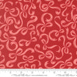 a red fabric with a repeating pattern of pink bows on it.