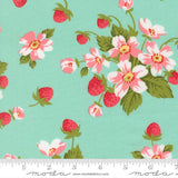 a repeating pattern of pink and white flowers with green leaves against a light blue background.