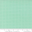 The image is a fabric with a grid pattern of small white dots or stars, creating a mint green or light green color.