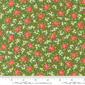 The image is a fabric with a floral pattern of red flowers and green leaves. The pattern is repeated across the fabric, creating a visually appealing and colorful design.