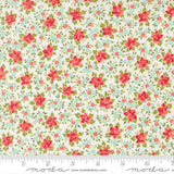 The image is a fabric with a floral pattern, featuring red flowers and green leaves. The fabric appears to be a light-colored material, possibly white or cream, with a repeating pattern of red flowers and green leaves. The image does not contain any text or additional objects, and the focus is on the floral pattern.