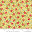 The image is a close-up of a fabric with a floral pattern, featuring small red flowers and green leaves on a yellow background.