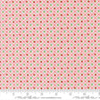 The image is a fabric with a pink and green checkered pattern, featuring small flower-like designs in shades of green and red.