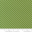 a close-up view of a fabric with a diagonal green stripe pattern. The fabric appears to be made of a material with a striped texture, and the image is described in terms of its size and the website Moda Fabrics.com.