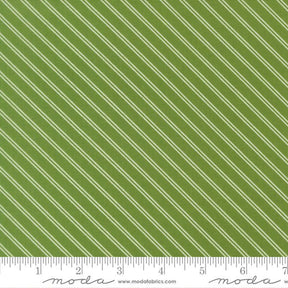 a close-up view of a fabric with a diagonal green stripe pattern. The fabric appears to be made of a material with a striped texture, and the image is described in terms of its size and the website Moda Fabrics.com.