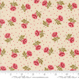 a fabric with a repeating pattern of red roses and green leaves, with small red dots scattered throughout the fabric.