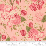a close-up view of a fabric with a floral pattern in shades of pink and green. The pattern includes various types of flowers, such as roses, hydrangeas, and tulips, as well as leaves and stems. The fabric appears to be a soft, pastel-colored material, suitable for clothing or home decor.