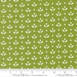 a repeating pattern of white flowers and leaves on a green background.