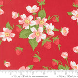 a vibrant red fabric adorned with a repeating pattern of pink and white flowers and green leaves. The flowers are arranged in a cluster, with some overlapping each other, creating a sense of depth and texture. The fabric appears to be a fabric with a floral pattern, possibly made of cotton or a similar material.