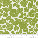 a repeating pattern of green flowers and leaves on a white background.