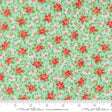 The image is a fabric with a floral pattern in shades of green and red. The pattern consists of small red flowers scattered across the fabric, creating a visually appealing and vibrant design.