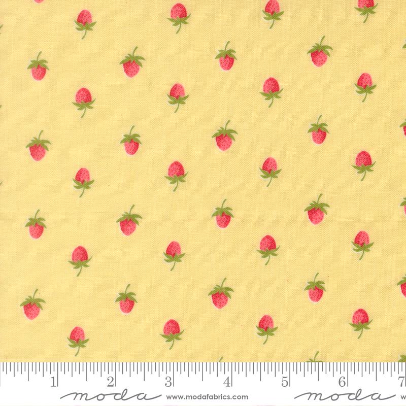 a repeating pattern of small red strawberries on a yellow background.
