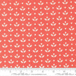 a repeating pattern of white flowers on a red background.