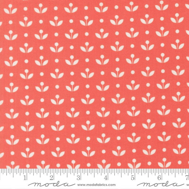 a repeating pattern of white flowers on a red background.