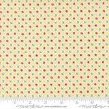 The image is a fabric with a yellow and green floral pattern, featuring small red and green flowers arranged in a diagonal grid.