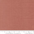 The image is a close-up of a fabric with a reddish-brown color, and it is not possible to describe the image in detail without resorting to redundancy and vague wording.