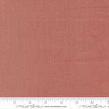 The image is a close-up of a fabric with a reddish-brown color, and it is not possible to describe the image in detail without resorting to redundancy and vague wording.