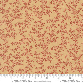 a fabric with a repeating pattern of red leaves and branches on a beige background.