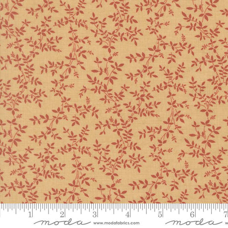 a fabric with a repeating pattern of red leaves and branches on a beige background.