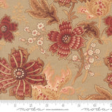 The image is a close-up of a fabric with a floral pattern in shades of brown and red. The pattern features large, detailed flowers and leaves, as well as smaller flowers and leaves, creating a visually appealing and intricate design.