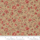 The image is a close-up of a fabric with a floral pattern in shades of brown and red. The fabric appears to be a beige color, and the pattern consists of various flowers and leaves in different sizes and orientations. The image does not contain any text or additional objects, and the focus is solely on the fabric and its floral design.