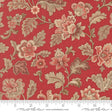 The image is a close-up of a red fabric with a floral pattern, featuring various flowers and leaves in shades of pink, red, and brown.