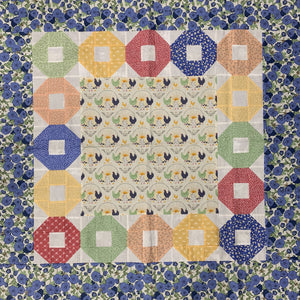 Put a Ring on It Topper Kit uses Break of Day fabric by Sweet Fire Road for Moda fabrics. This topper is 42&quot; x 42&quot; Includes Book