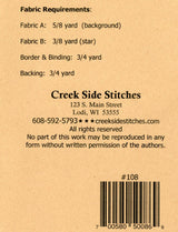 Cookie Cut Starburst # CSS108 Creek Side Stitches Table Runners & Toppers Size: Topper 48in x 18in bin mp