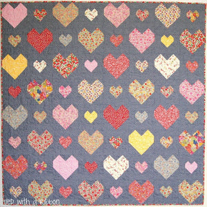 Kiss Chasey Quilt Pattern #TR022 Printed Pattern by Tied with a Ribbon Finished Size 64" x 64"